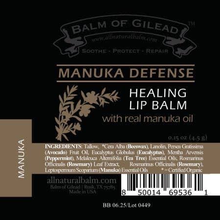 Balm of Gilead Manuka Defense Healing Lip Balm label on a black background